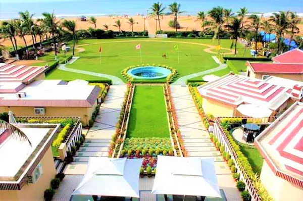 Resort lawns rolling down to Golden Beach, Puri