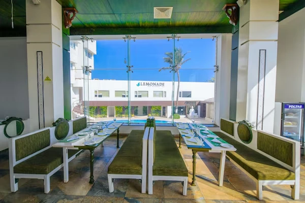 Restaurant seating overlooking the pool